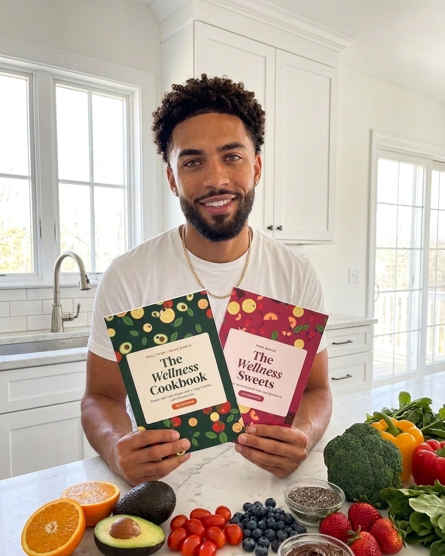 Jordan holding The Wellness Cookbook and the The Wellness Sweets bonus